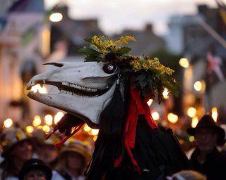 If you’re staying with us this weekend, you’re in for something truly Cornish… it’s Mazey Day in Penzance.

Part of the Golowan Festival — Cornwall’s vibrant celebration of the midsummer solstice — Mazey Day fills the town with colour, music and tradition. 

You’ll see giant sculptures, parades, dancers, and of course Penglaz, the famous Cornish Obby Oss who leads the festivities with drums, cheers and a little mischief.

And a lovely extra… I’ll be performing with Cornwall’s Rock Choir in Penlee Park at 12, so if you’re in town, come and say hello.

Expect crowds, sunshine, street performers, makers, music, food stalls and that unmistakable Penzance buzz. A brilliant way to add a bit of Cornish magic to your weekend.

#golowan #mazeyday #penzance #cornwalllife #beershebafarm 

Pics: Penzance Council; Cam de Pete