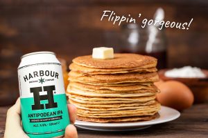 Can IPA beer and stack of pancakes
